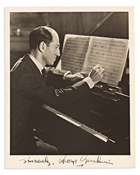 <b>Swann, Nov. 6:</b> Lot 153: George Gershwin, Photograph Signed and Inscribed, portrait by Renato Toppo.